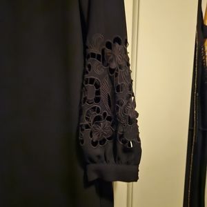 Black H&M shift dress with lazer cut floral sleeves